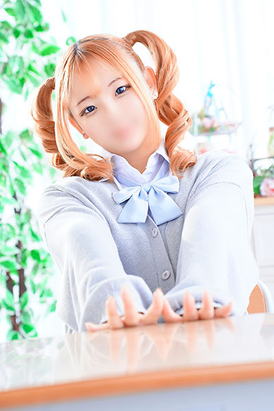 �߂���